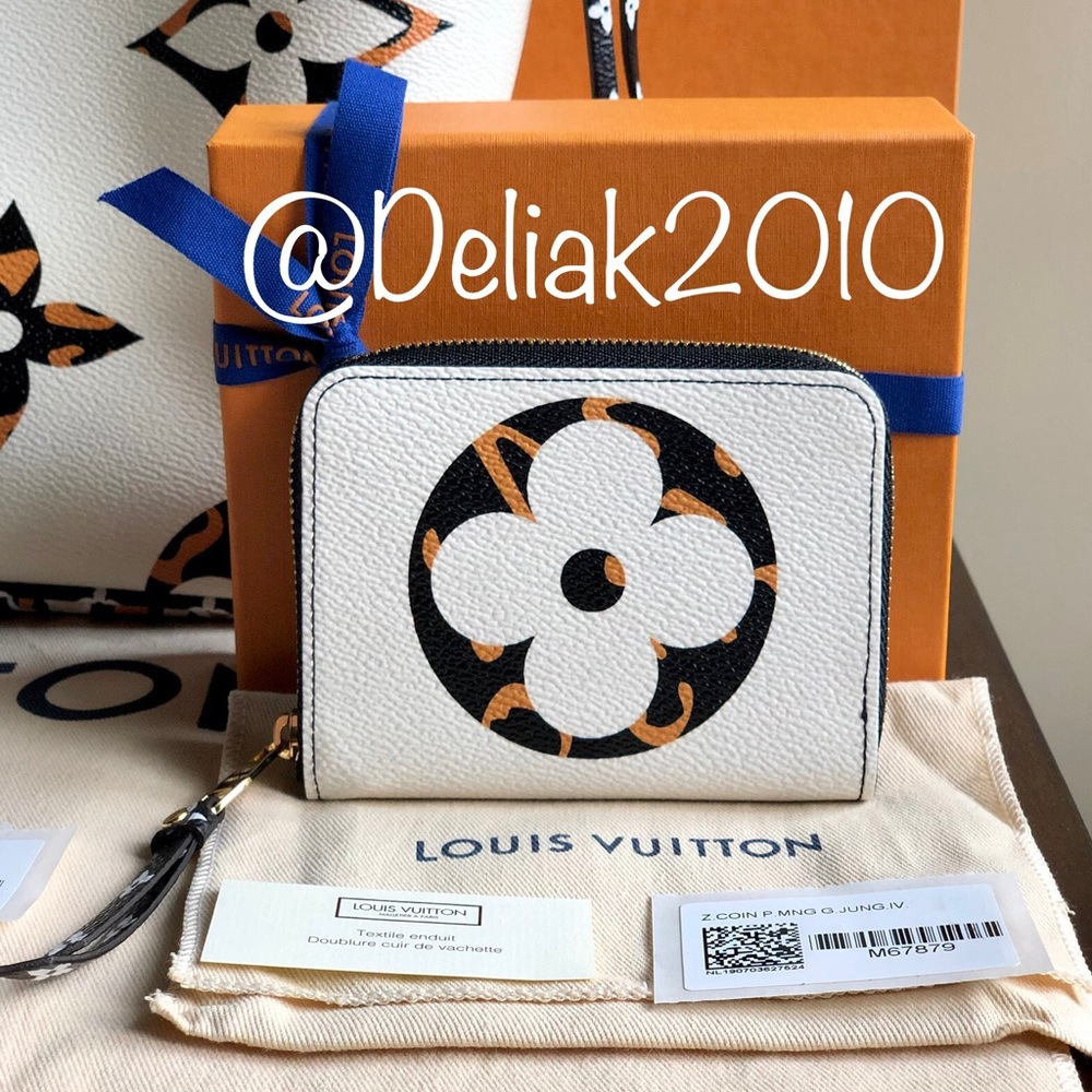 SOLD! Louis Vuitton Jungle Zippy Wallet Ivory